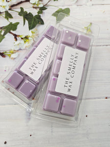 A purple wax melt snapbar in the scent damson plum rose and patchouli by the smelly wax company