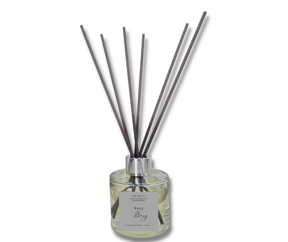 Reed diffuser glass and reeds in the scent very berry by the smelly wax company