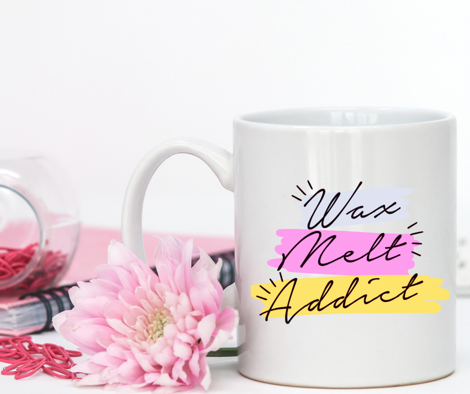 wax melt addict mug in bright colours with flowers in the background by the smelly wax company